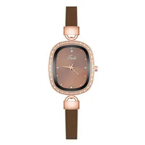 Detailed macro of vintage rose gold oval watch case with sparkling crystal bezel