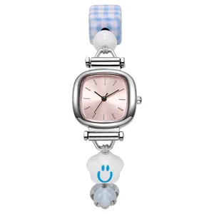 Minimalist women's ceramic beaded watch with pink square dial and smile flower strap