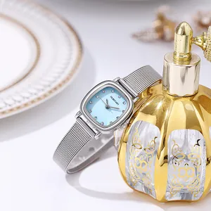 Elegant women's square quartz watch with light blue dial and silver mesh strap detail