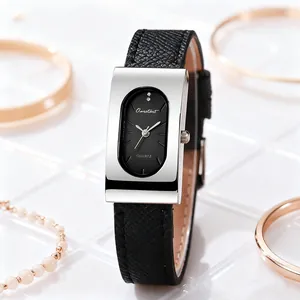 Detail of vintage rectangular quartz watch with silver case and black leather strap