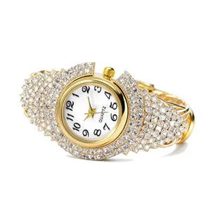 Luxurious gold quartz watch for women featuring full crystal-encrusted bracelet design