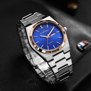 Detail of blue sunray dial and dual calendar window on stainless steel men's watch