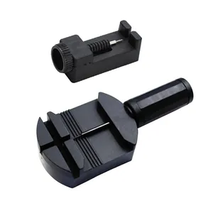 Detail view of manual watch link remover tool kit for metal strap adjustment