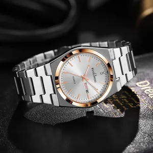 Macro view of men's quartz watch with dual calendar display and rose gold bezel