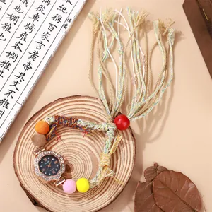Ethno-Boho-Armbanduhr mit gewebten Perlen, roségoldenem Strass-Zifferblatt und bunten Quasten