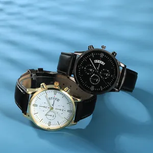 Close-up of stylish men's quartz watches with calendar and leather straps on blue water background