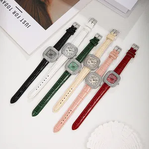 Flat lay of luxury square quartz watches with diamond bezels in six varied strap colors
