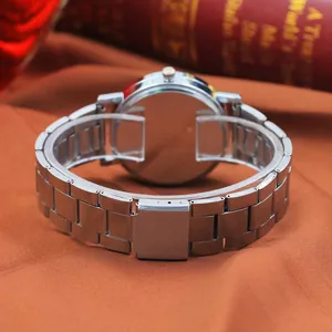 Close-up of silver stainless steel watch strap and folding clasp on professional background