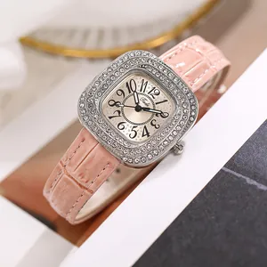 Macro detail of Tadi women's quartz watch featuring sparkling crystals and pink leather strap