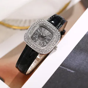 Close-up of Tadi square quartz watch featuring a rhinestone bezel and black leather strap