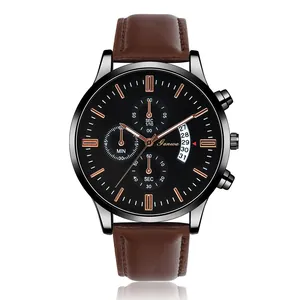 Detailed view of men's chronograph watch with rose gold indices and dark brown leather strap