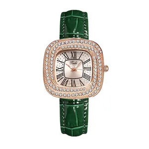 Montre quartz femme avec strass, boîtier or rose et bracelet en cuir vert façon croco