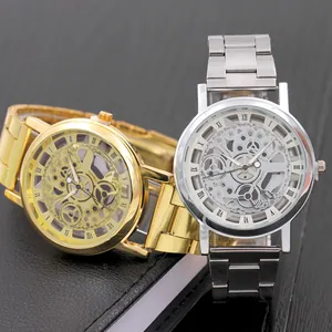 Close-up of skeleton hollow dial watches in gold and silver with Roman numeral markers