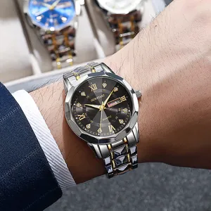 Close-up of luxury men's quartz watch with double calendar and Roman numeral dial
