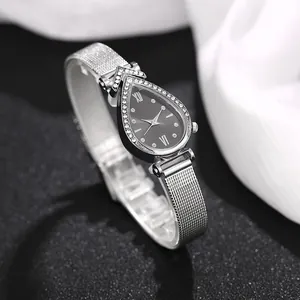 Detail of drop-shaped quartz watch with silver mesh band and diamond-encrusted bezel