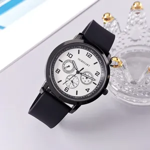 Detail view of quartz watch with black silicone strap and multi-dial display feature