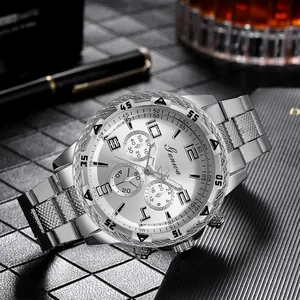 Detailed close-up of a silver stainless steel watch dial with three sub-dials and markers