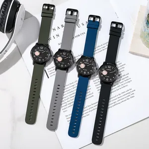 Minimalist quartz watches with silicone straps in four colors on a lifestyle background