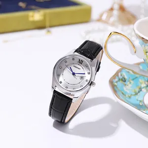 Detail of elegant ladies quartz watch with blue hands, sunray dial and date window