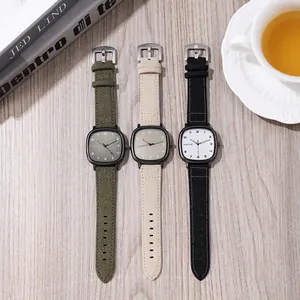 Minimalist square quartz watches with leather straps in green, beige, and black
