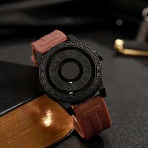 Detail of magnetic steel ball watch dial with roman numerals and brown silicone strap