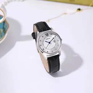 Detail of elegant ladies quartz watch with sunburst dial and black leather strap