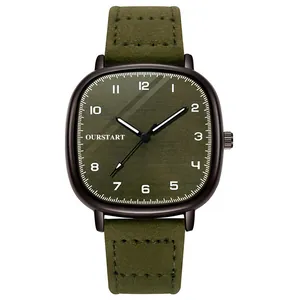 Minimalist quartz watch with olive green dial and matching leather strap in flat lay view