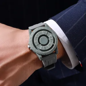 Detail view of magnetic ball watch with roman numerals on grey matte finish dial