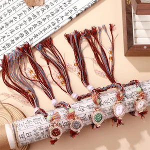 Retro hand-woven quartz watch with rhinestone bezel and colorful tassel strap