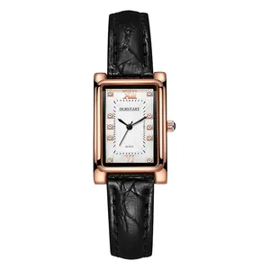 Detailed close-up of a square rose gold watch dial with Roman numerals and rhinestones