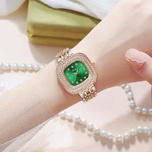 Macro detail of luxury square quartz watch with green dial and diamond-set bezel