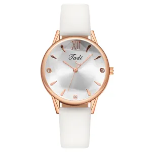 Elegant women's watch with white leather strap and rose gold rhombus glass dial case