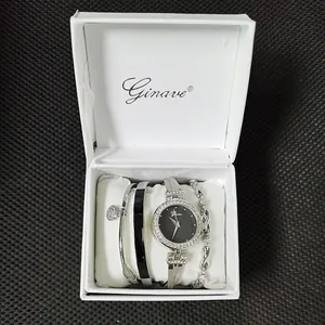 Reloj de cuarzo para mujer y set de pulseras plateadas en caja de regalo blanca acolchada