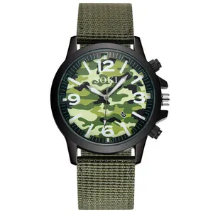 Detail of SOKI camouflage quartz watch featuring date display and green nylon strap