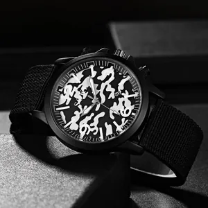 Close-up of military quartz watch with camouflage dial and black nylon woven strap