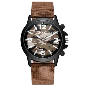 Detail of SOKI military quartz watch featuring brown camouflage dial and nylon canvas strap