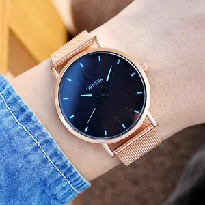Detailed view of Geneva rose gold mesh strap watch with navy blue gradient dial