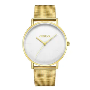 Macro view of gold Milanese mesh strap and polished alloy case on Geneva quartz watch