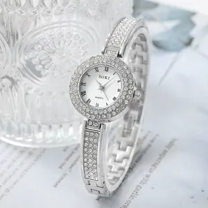 Orologio al quarzo da donna in argento con strass scintillanti sul cinturino e sulla lunetta