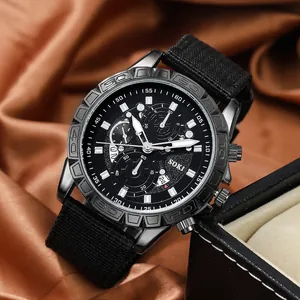 Detail of SOKI men's quartz sports watch with black dial and canvas strap on brown silk