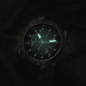 Luminous hands and hour markers on SOKI men's sports watch glowing in the dark
