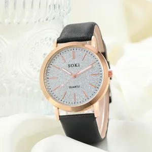 Elegant rose gold quartz watch with silver glitter dial and black leather strap