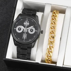Coffret montre homme avec montre en acier noir et bracelet à maillons dorés élégant