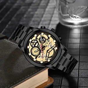 Close-up of SOKI black and gold skeletal quartz watch with multi-dial calendar features