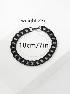 Close-up of a 23g black Cuban link bracelet with lobster clasp and 18cm length detail