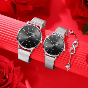 Detail of silver mesh band couple watches with black dials and infinity charm bracelet