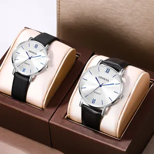 Close-up of Geneva couple quartz watches with silver dials and blue hands on cushions