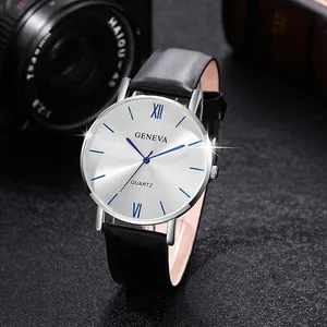 Macro detail of quartz watch with silver brushed dial, blue hands, and black leather strap
