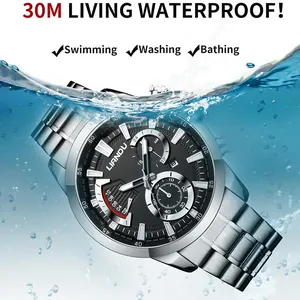Detail of luxury men's steel watch submerged in water showing 30M waterproof capability