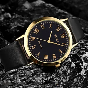 Quarzuhr für Herren mit goldenem Gehäuse, schwarzem Zifferblatt und Lederarmband auf Stein
